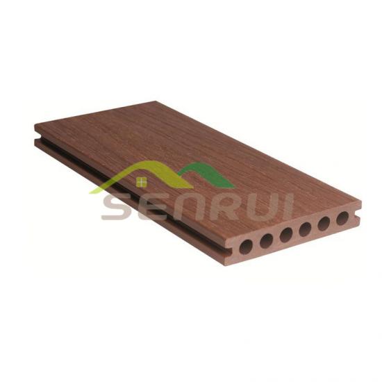 Wood plastic composite co-extruded round hole decking