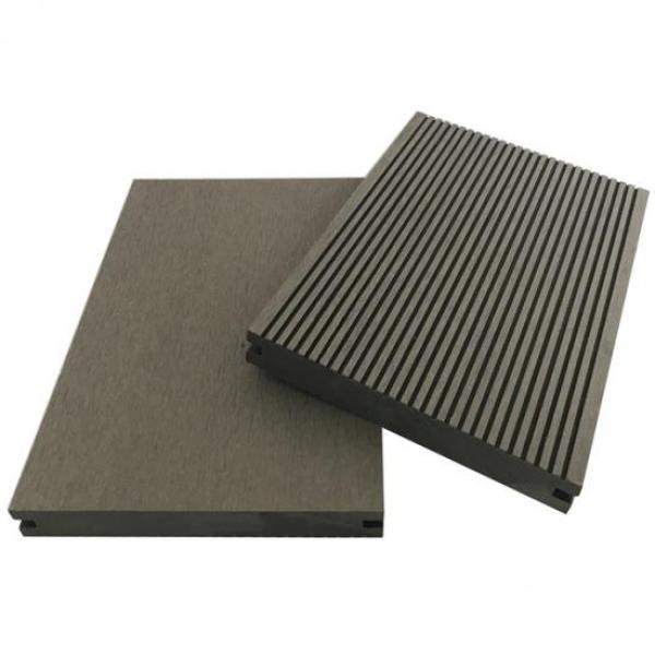 Wood plastic composite solid decking material